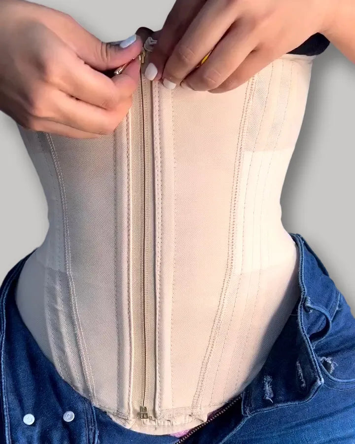 CurvyFaja - Sleeveless Shaping Top with Waist Trainer Effect, Front Zipper & Button Closure
